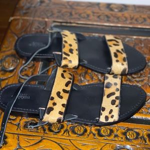 UO Cheetah print leather sandals